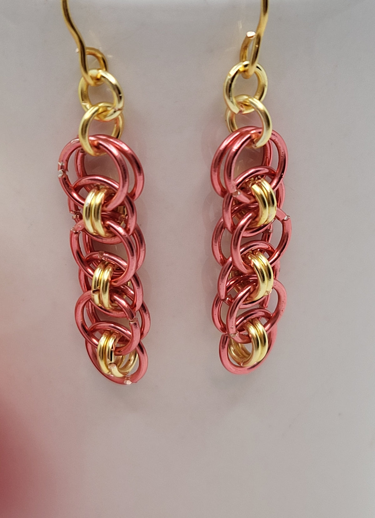 Gold and coral chain mail earrings
