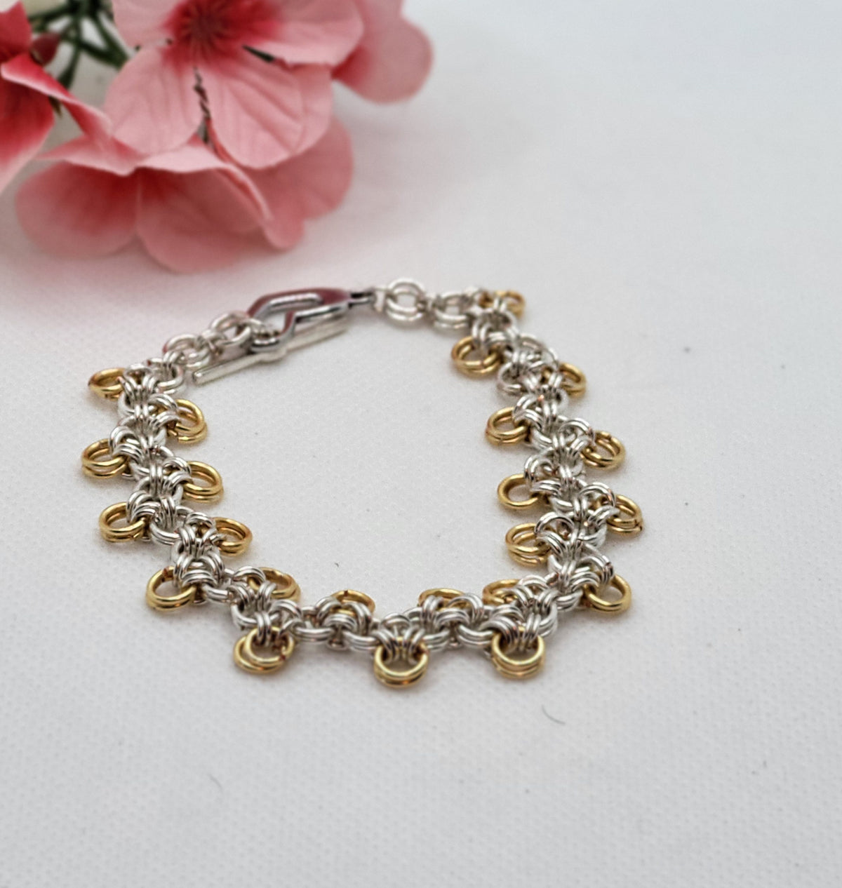 Silver and gold chain mail bracelet with heart clasp