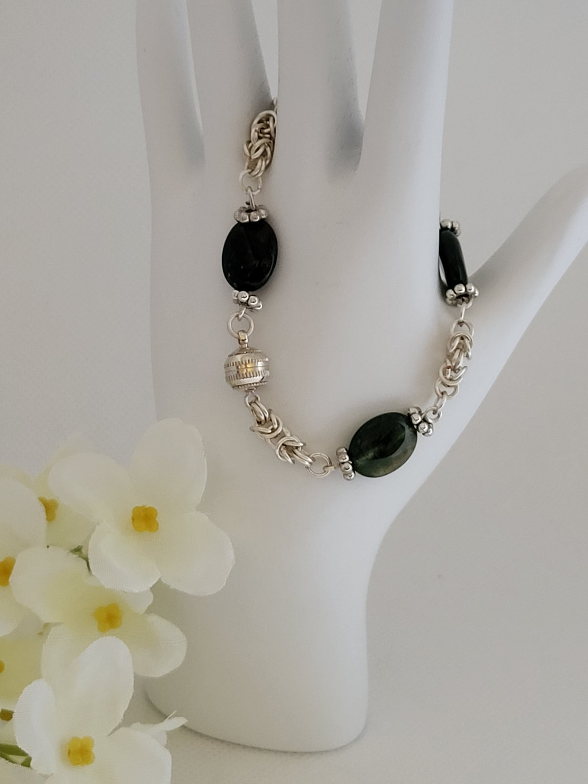 Silver chain mail braclet with green beads and magnetic clasp