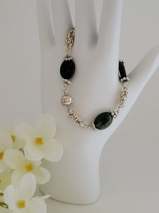 Silver chain mail braclet with green beads and magnetic clasp