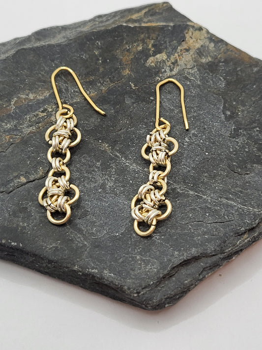 gold and silver chain mail design earrings