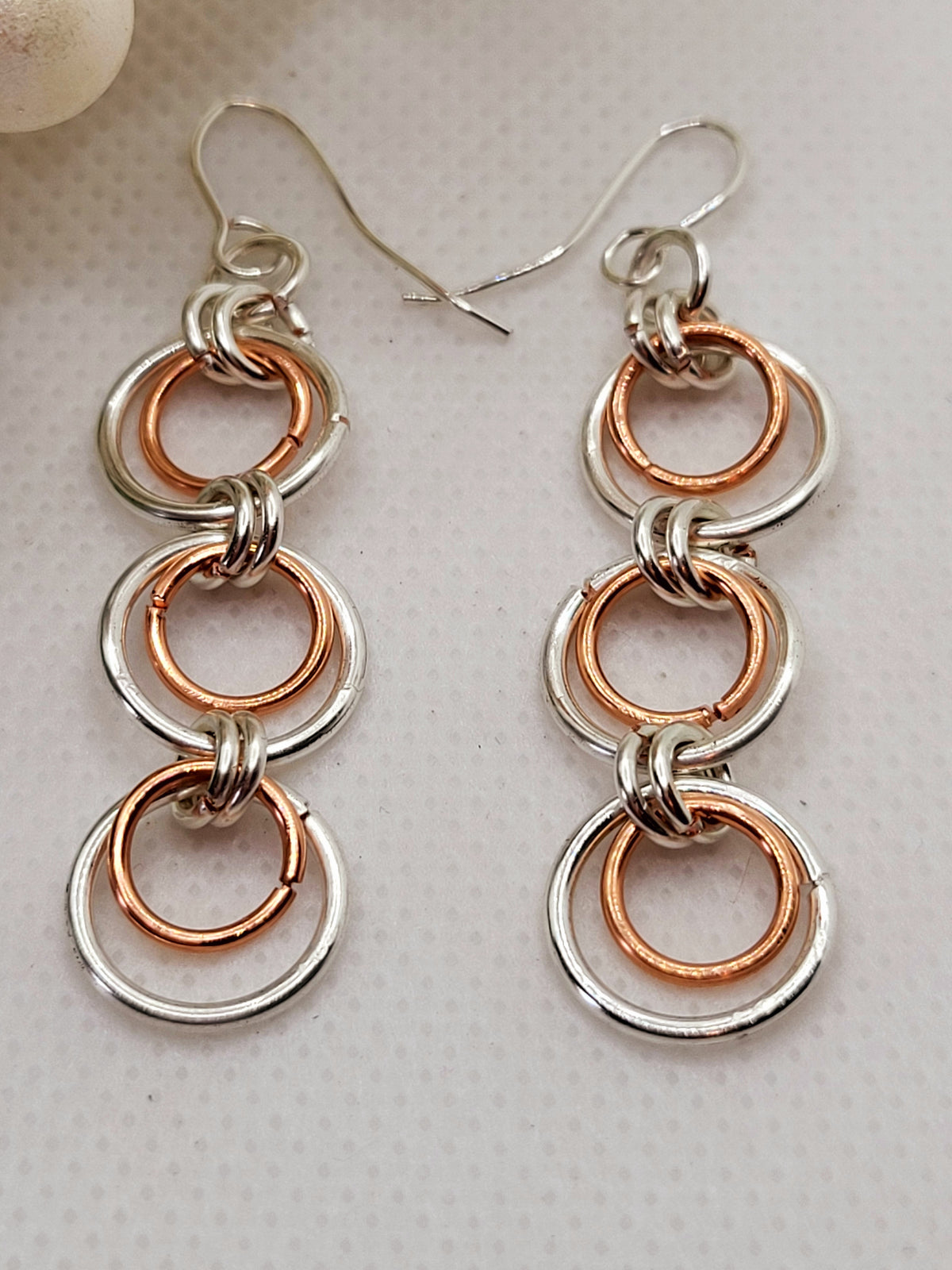 Silver and copper triple hoop earrings