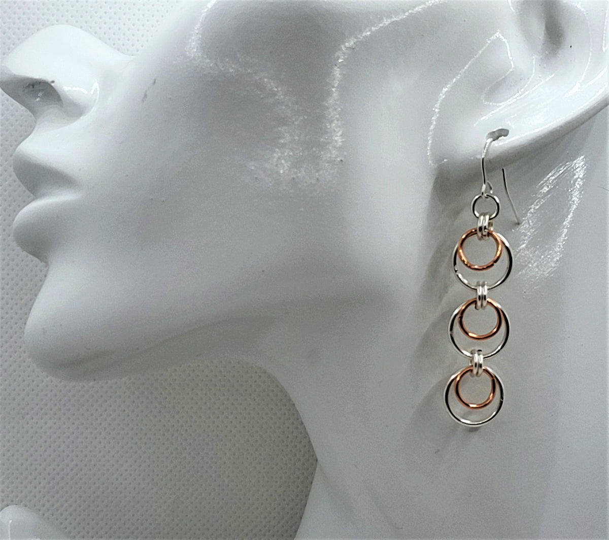 Silver and copper triple hoop earrings